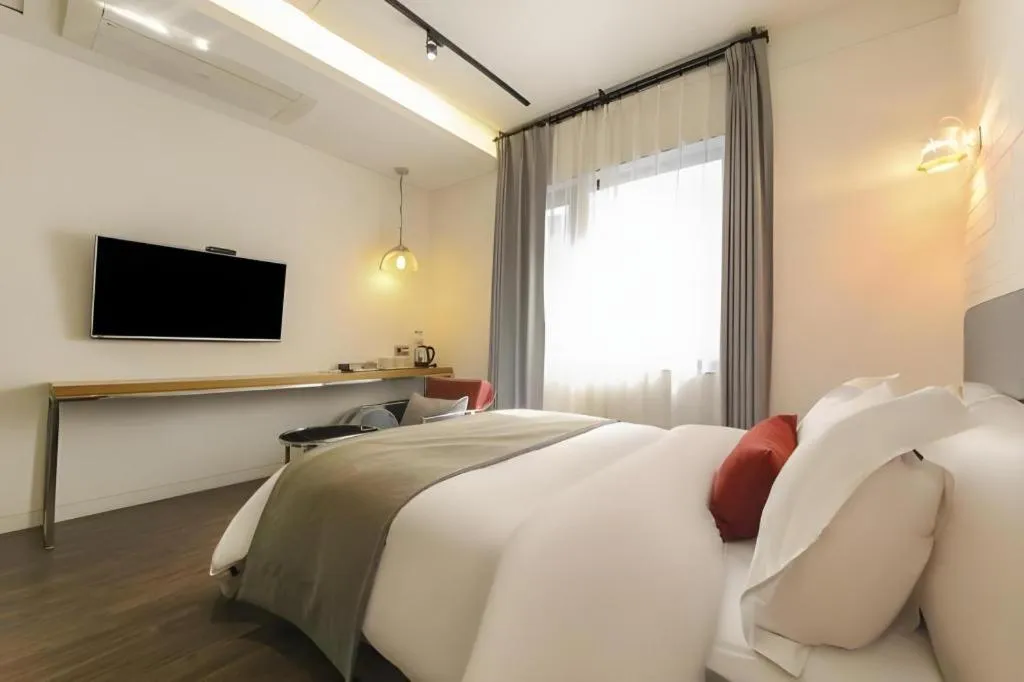 Bed in Daejeon Namoo Hotel