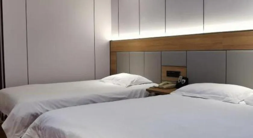 Bed in GreenTree Inn Shanghai Hongqiao Hub Convention Center Jinghua Road Shell Hotel