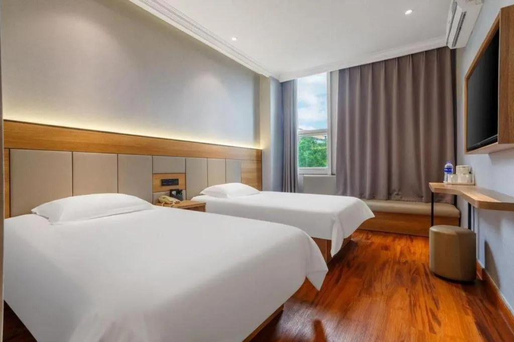 Bed in GreenTree Inn Shanghai Hongqiao Hub Convention Center Jinghua Road Shell Hotel