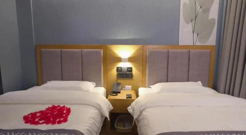 Bed in GreenTree Inn Puyang Ruifengyuan Business Hotel