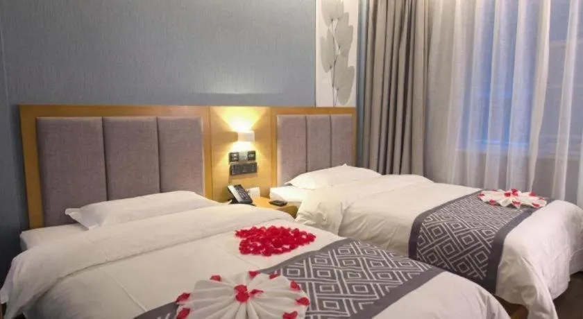 Bed in GreenTree Inn Puyang Ruifengyuan Business Hotel