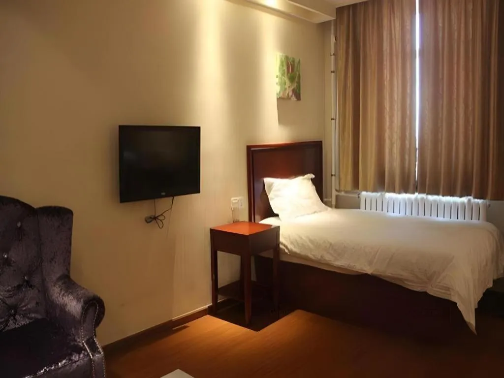 Bed in GreenTree Inn Beijing East Yizhuang District Second Kechuang Street Express Hotel