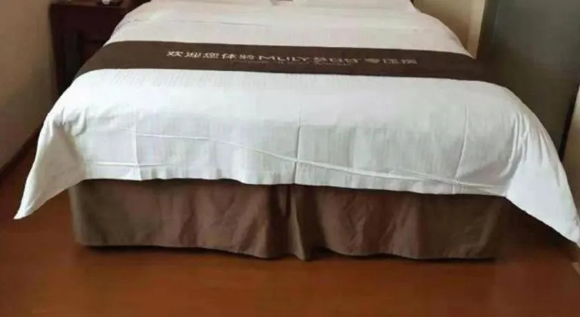 Bed in GreenTree Inn Beijing East Yizhuang District Second Kechuang Street Express Hotel