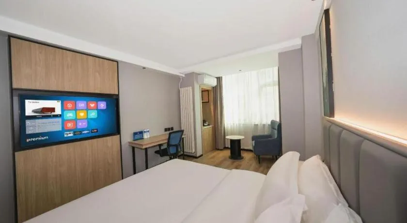 Bed in GreenTree Inn Beijing Capital Airport New International Exhibition Center Express Hotel