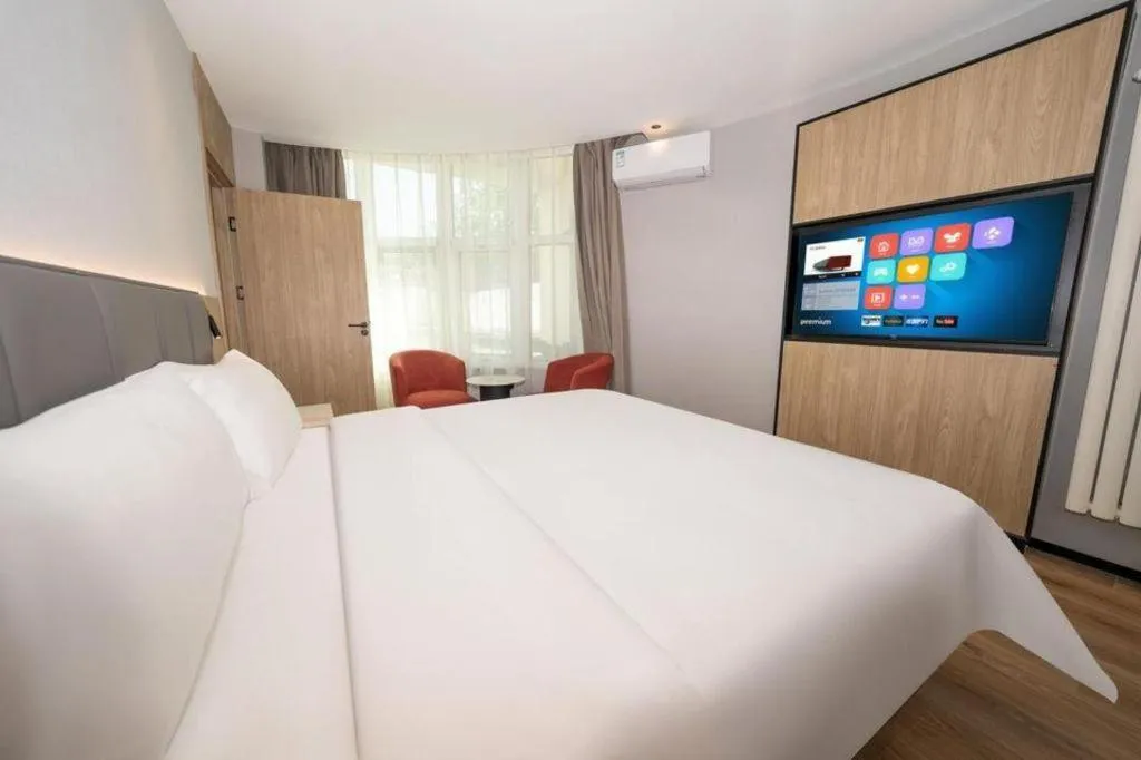 Bed in GreenTree Inn Beijing Capital Airport New International Exhibition Center Express Hotel