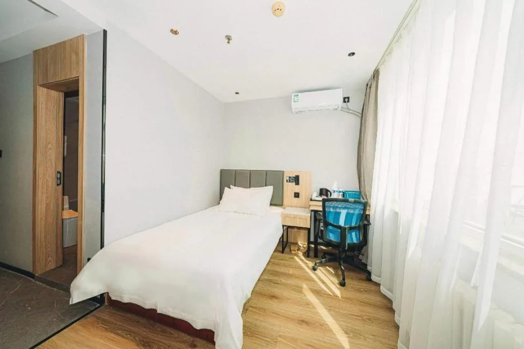 Bed in GreenTree Inn Beijing Capital Airport New International Exhibition Center Express Hotel