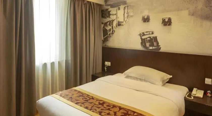 Bed in GreenTree Inn Huzhou South Street Chaoyin Bridge Business Hotel