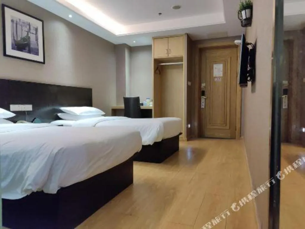 Bed in GreenTree Inn Huzhou South Street Chaoyin Bridge Business Hotel