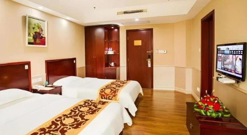 Bed in GreenTree Inn Jieyang North Linjiang Road Express Hotel