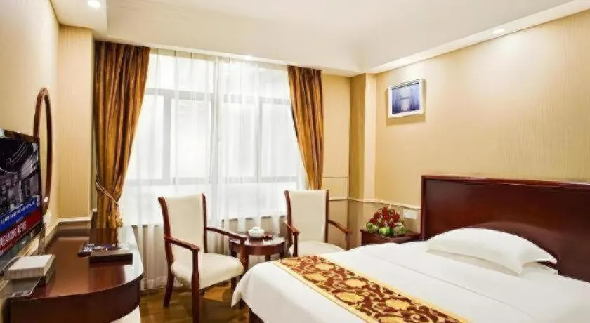 Bed in GreenTree Inn Jieyang North Linjiang Road Express Hotel