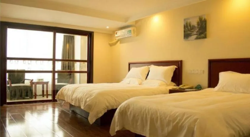 Bed in GreenTree Inn Lianyungang Guanyun Bus Station Zhenxing Garden Express Hotel
