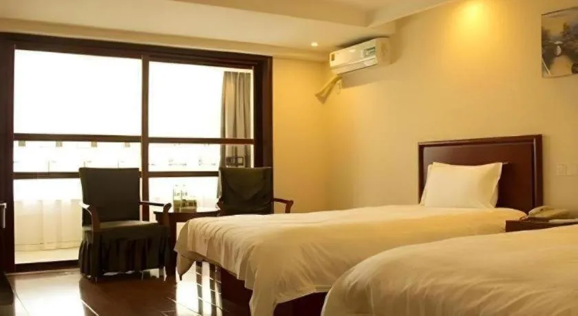 Bed in GreenTree Inn Lianyungang Guanyun Bus Station Zhenxing Garden Express Hotel