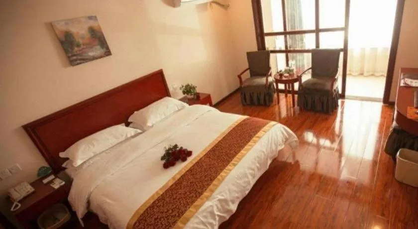 Bed in GreenTree Inn Lianyungang Guanyun Bus Station Zhenxing Garden Express Hotel