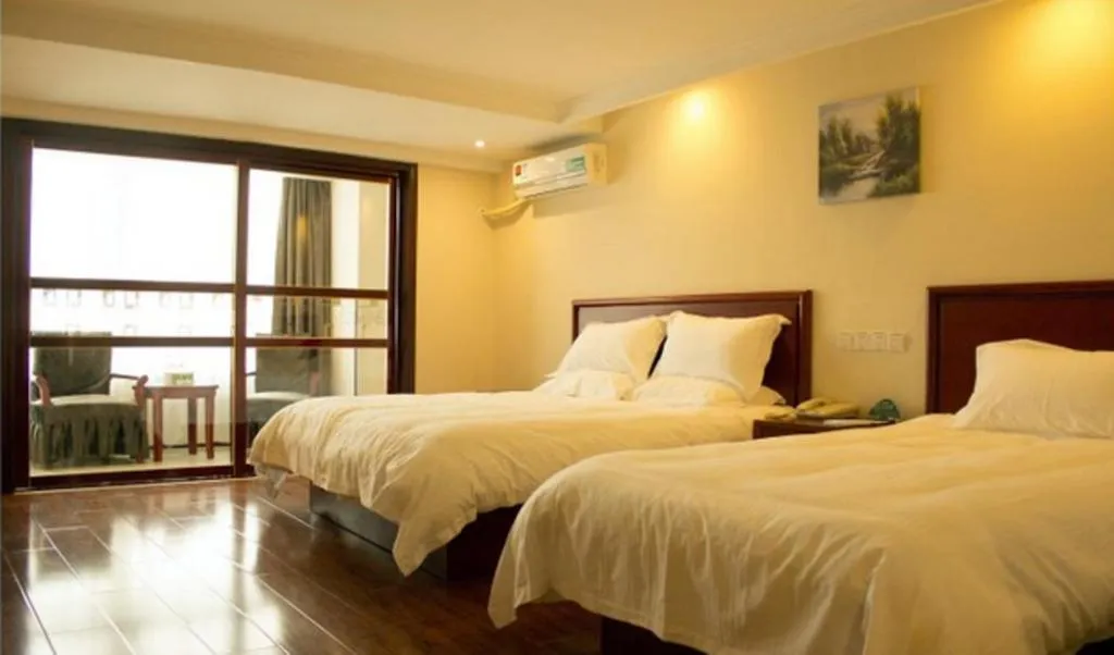 Bed in GreenTree Inn Lianyungang Guanyun Bus Station Zhenxing Garden Express Hotel