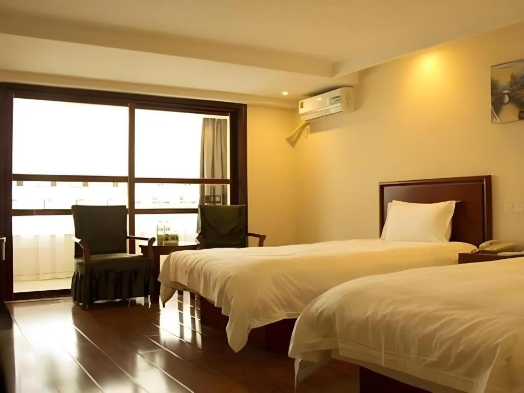 Bed in GreenTree Inn Lianyungang Guanyun Bus Station Zhenxing Garden Express Hotel