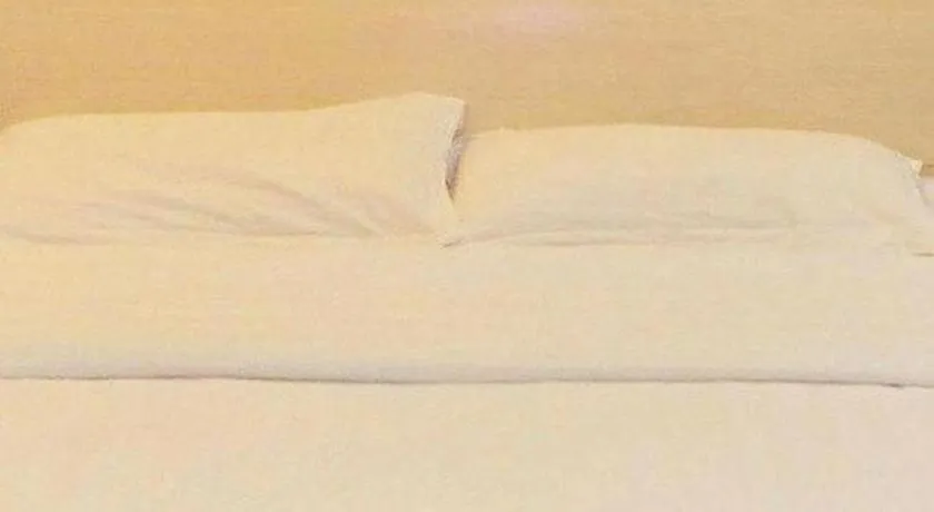 Bed in GreenTree Inn Lianyungang Guanyun Bus Station Zhenxing Garden Express Hotel