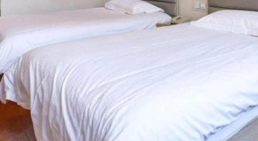 Bed in GreenTree Inn Lianyungang Guanyun Bus Station Zhenxing Garden Express Hotel