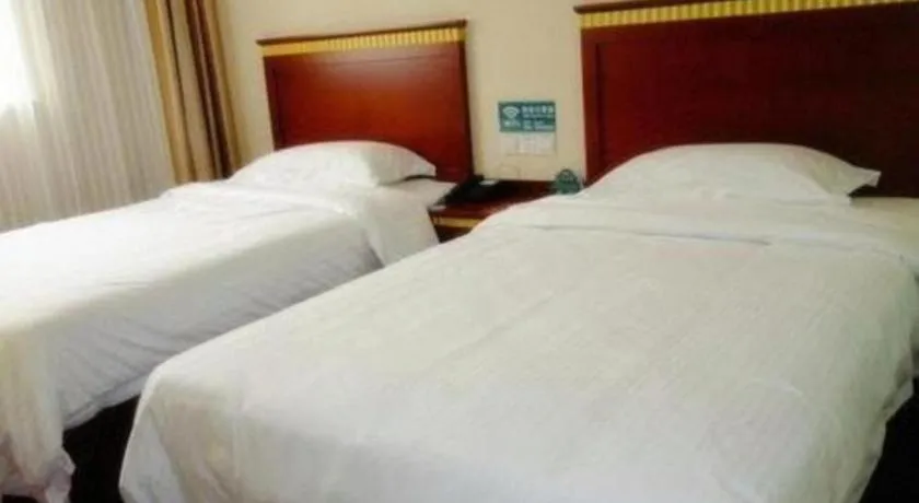 Bed in GreenTree Inn Lianyungang Guanyun Bus Station Zhenxing Garden Express Hotel