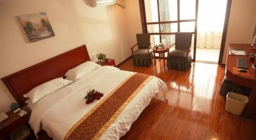 Bed in GreenTree Inn Lianyungang Guanyun Bus Station Zhenxing Garden Express Hotel