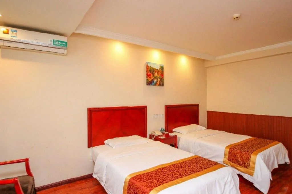 Bed in GreenTree Inn Lianyungang Guanyun Bus Station Zhenxing Garden Express Hotel