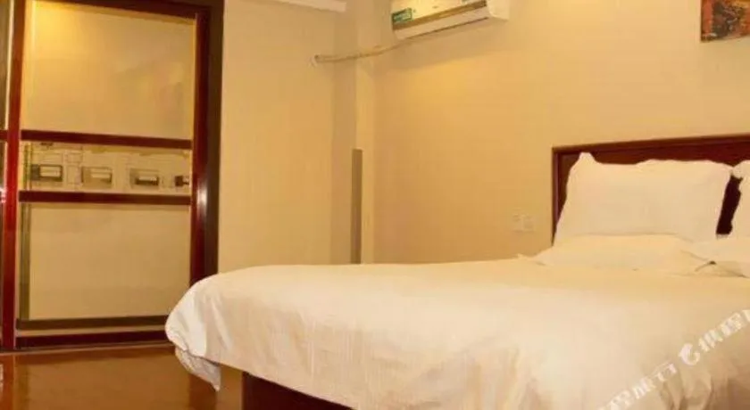 Bed in GreenTree Inn Lianyungang Guanyun Bus Station Zhenxing Garden Express Hotel