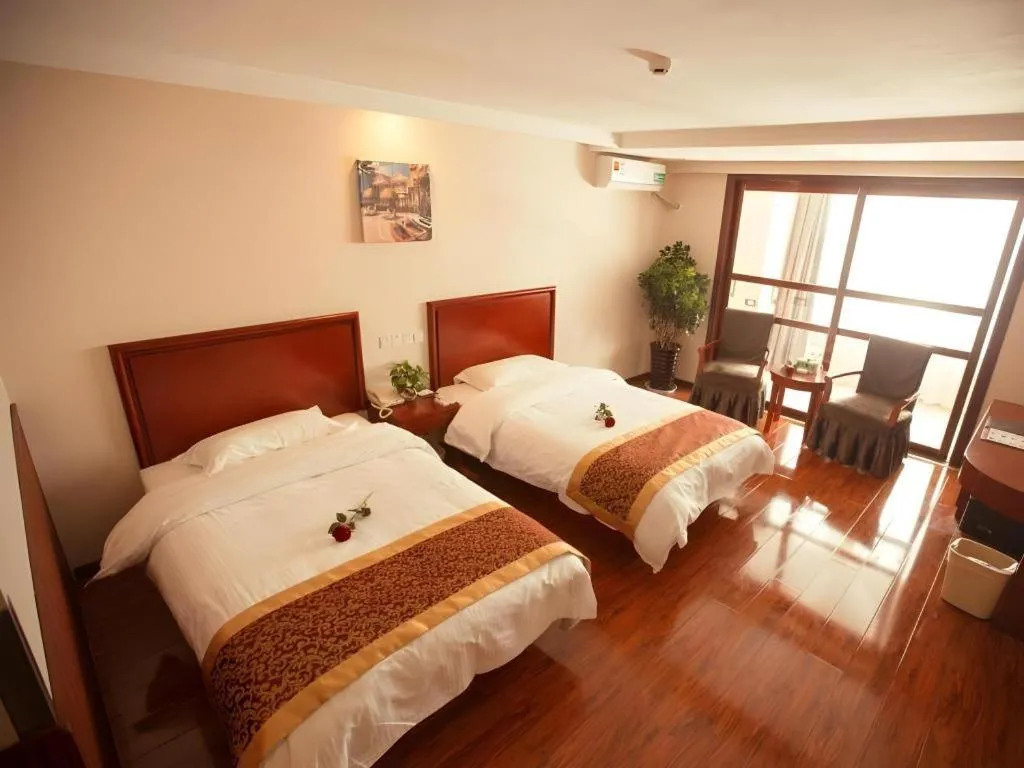 Bed in GreenTree Inn Lianyungang Guanyun Bus Station Zhenxing Garden Express Hotel