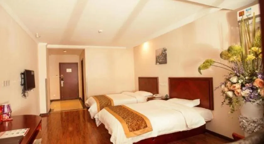 Bed in GreenTree Inn Lianyungang Guanyun Bus Station Zhenxing Garden Express Hotel