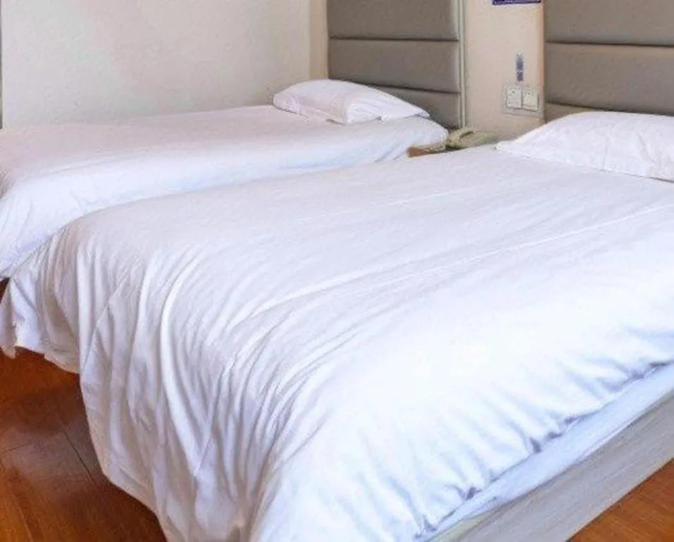Bed in GreenTree Inn Lianyungang Guanyun Bus Station Zhenxing Garden Express Hotel