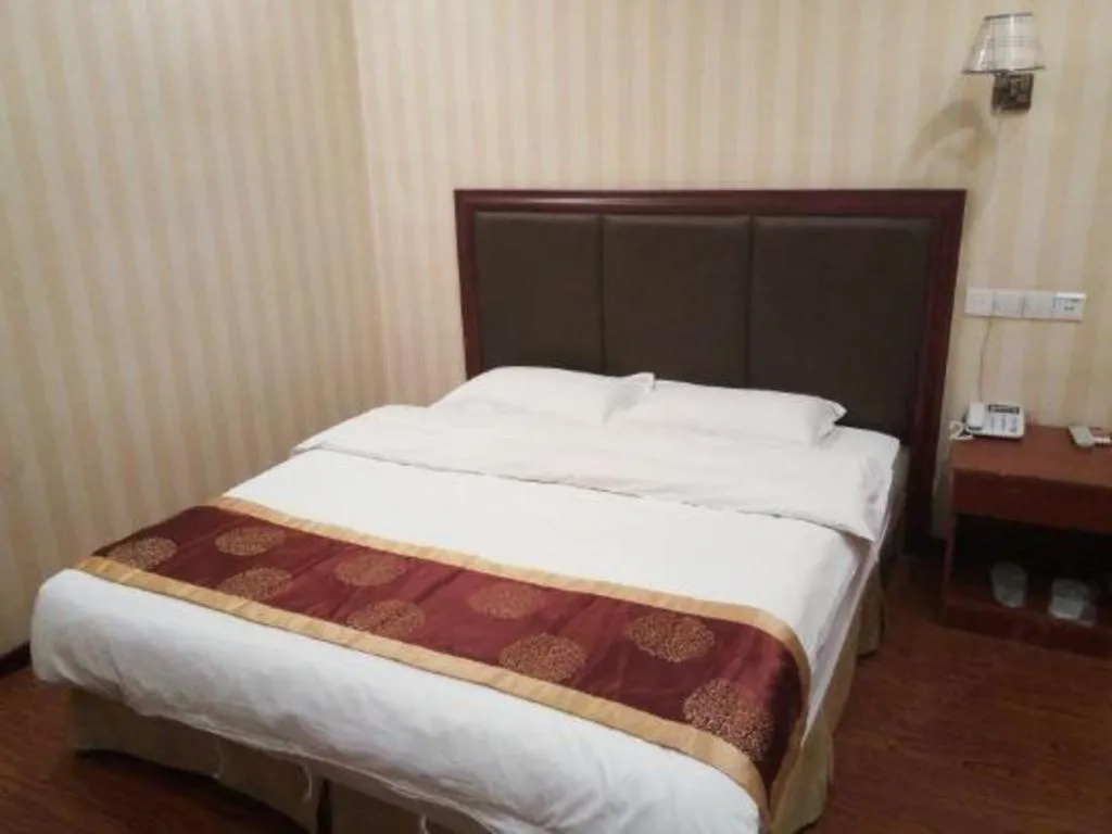 Bed in GreenTree Inn Lianyungang Guanyun Bus Station Zhenxing Garden Express Hotel