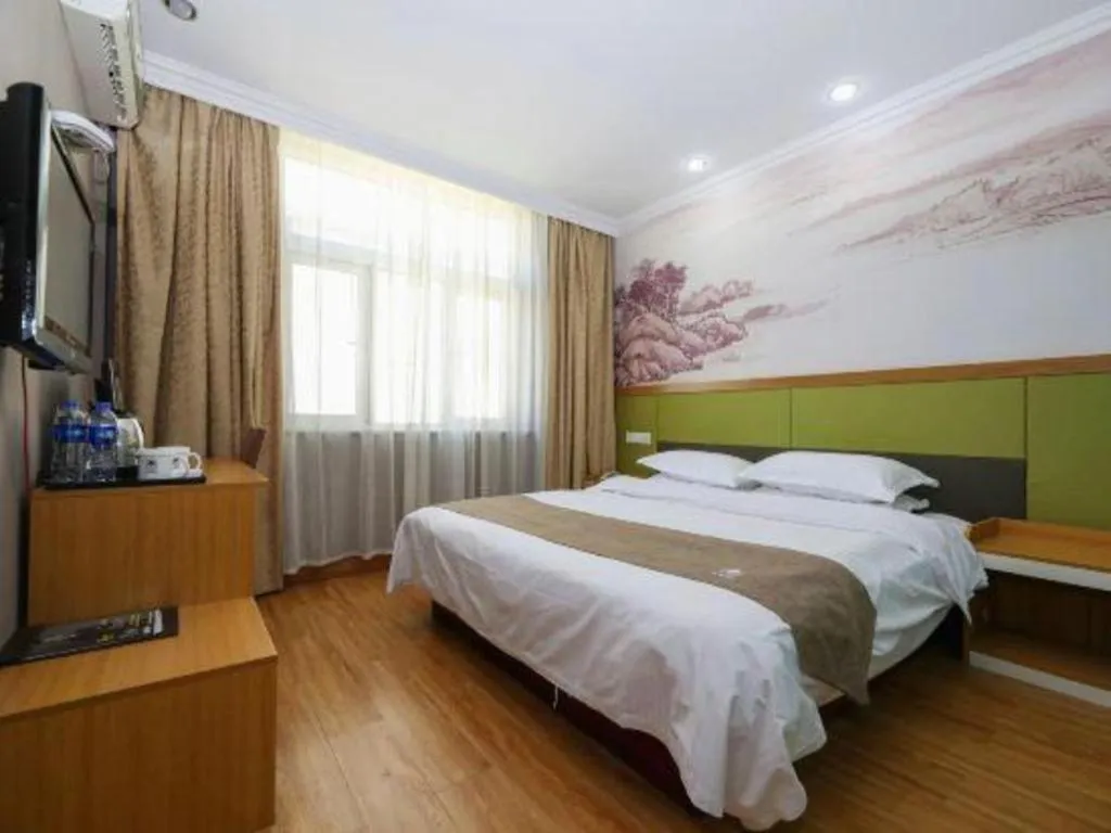 Bed in GreenTree Inn Zhejiang Ningbo Exhibition and Convention Center Bus East Station Express Hotel