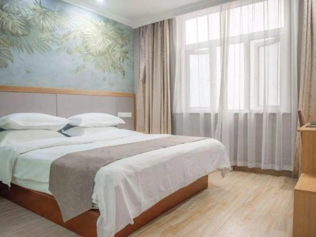 Bed in GreenTree Inn Zhejiang Ningbo Exhibition and Convention Center Bus East Station Express Hotel