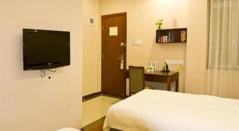 Bed in GreenTree Inn Zhejiang Ningbo Exhibition and Convention Center Bus East Station Express Hotel