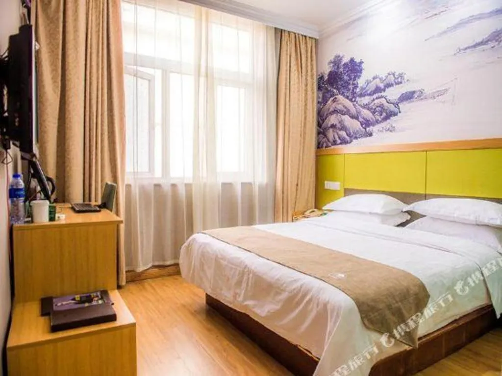 Bed in GreenTree Inn Zhejiang Ningbo Exhibition and Convention Center Bus East Station Express Hotel