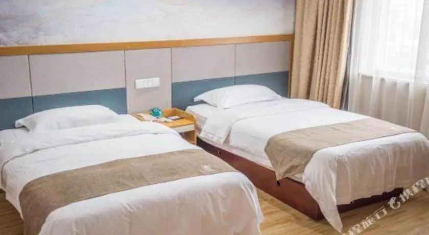 Bed in GreenTree Inn Zhejiang Ningbo Exhibition and Convention Center Bus East Station Express Hotel