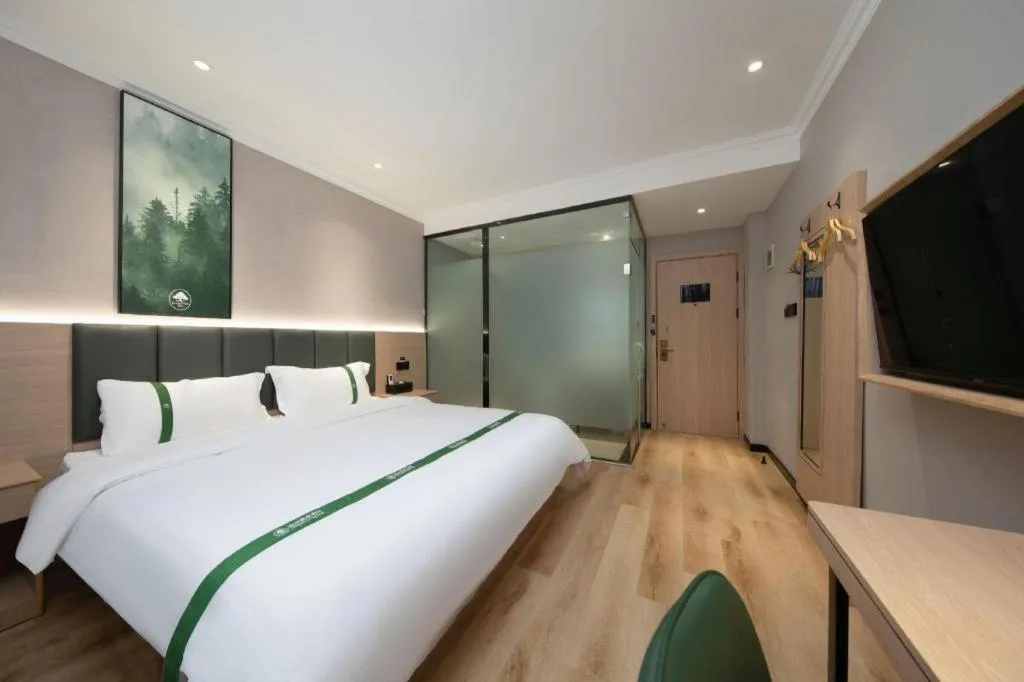 Bed in GreenTree Inn Zhejiang Ningbo Exhibition and Convention Center Bus East Station Express Hotel