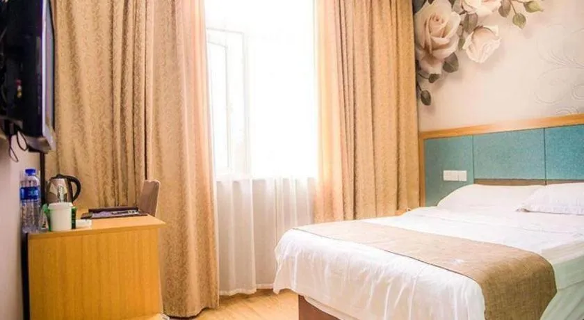 Bed in GreenTree Inn Zhejiang Ningbo Exhibition and Convention Center Bus East Station Express Hotel