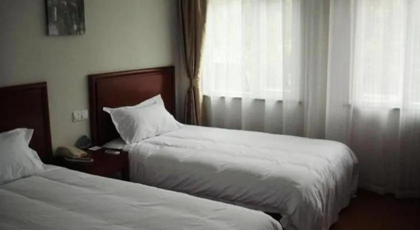 Bed in GreenTree Inn Zhejiang Ningbo Exhibition and Convention Center Bus East Station Express Hotel