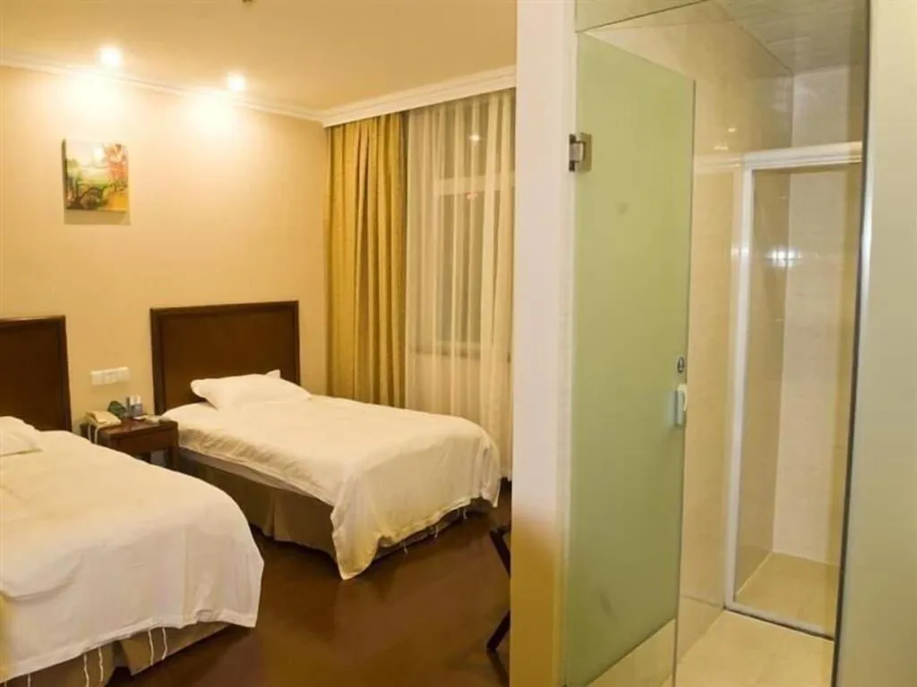 Bed in GreenTree Inn Zhejiang Ningbo Exhibition and Convention Center Bus East Station Express Hotel