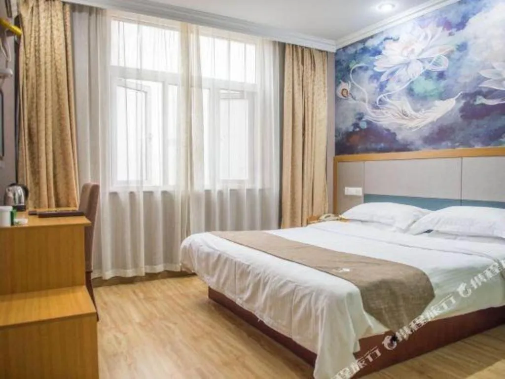 Bed in GreenTree Inn Zhejiang Ningbo Exhibition and Convention Center Bus East Station Express Hotel