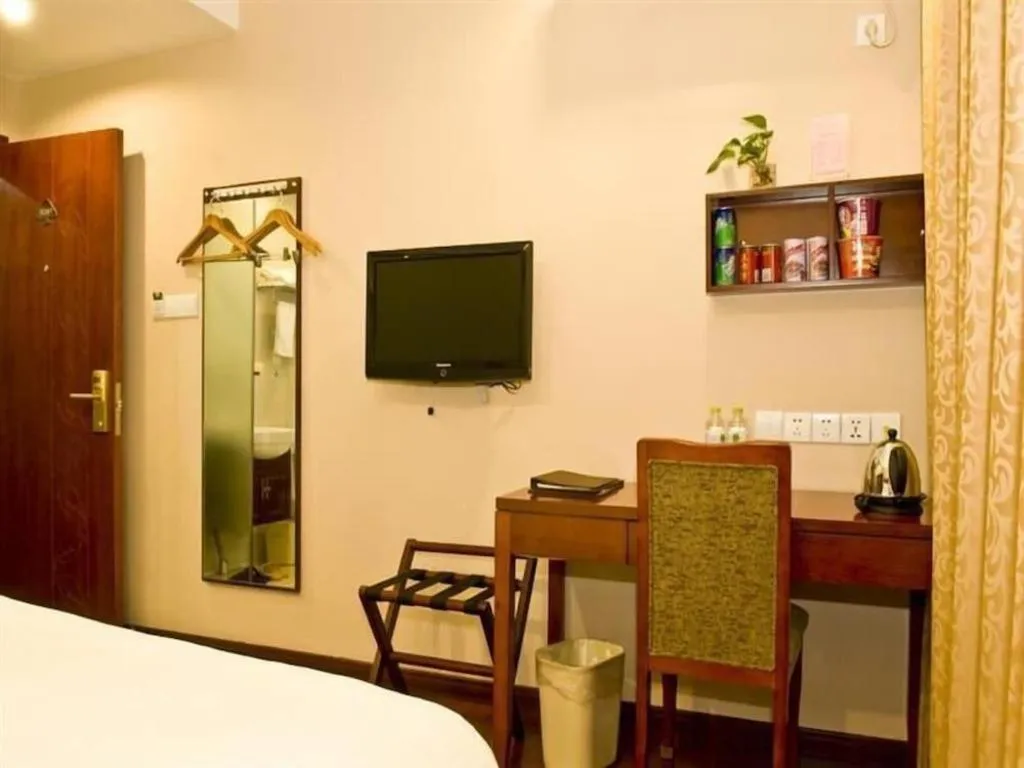 Bed in GreenTree Inn Zhejiang Ningbo Exhibition and Convention Center Bus East Station Express Hotel