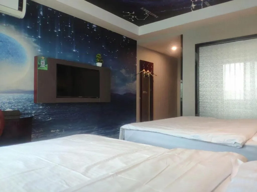 Bed in GreenTree Inn Guangzhou Baiyun International Airport Huaxi Road Express Hotel