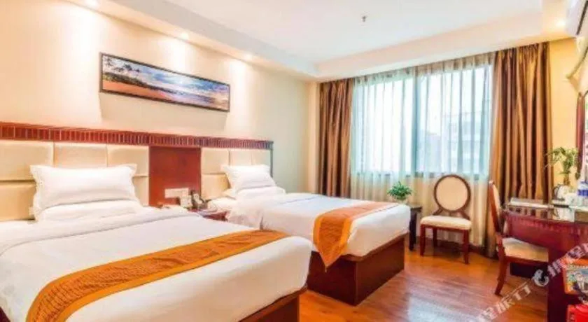 Bed in GreenTree Inn Guangzhou Baiyun International Airport Huaxi Road Express Hotel