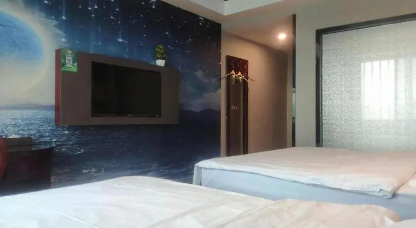 Bed in GreenTree Inn Guangzhou Baiyun International Airport Huaxi Road Express Hotel