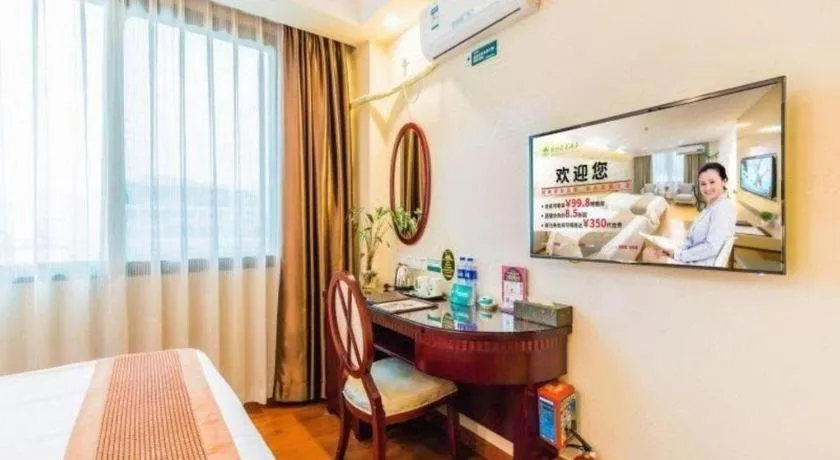 Bed in GreenTree Inn Guangzhou Baiyun International Airport Huaxi Road Express Hotel