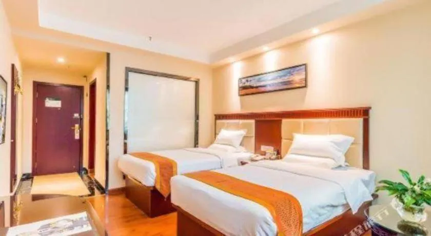 Bed in GreenTree Inn Guangzhou Baiyun International Airport Huaxi Road Express Hotel