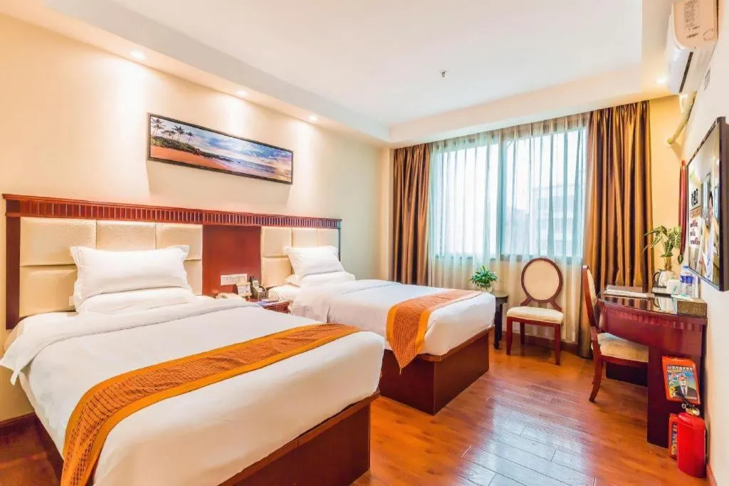Bed in GreenTree Inn Guangzhou Baiyun International Airport Huaxi Road Express Hotel