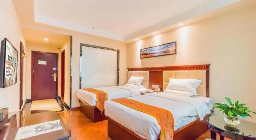Bed in GreenTree Inn Guangzhou Baiyun International Airport Huaxi Road Express Hotel