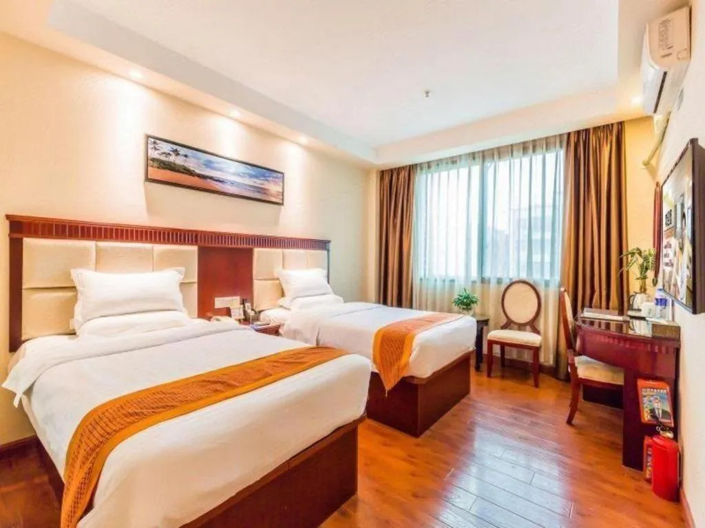 Bed in GreenTree Inn Guangzhou Baiyun International Airport Huaxi Road Express Hotel