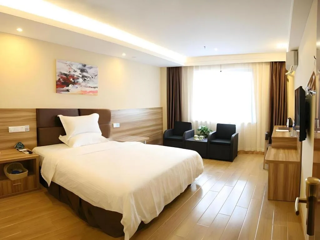 Bed in GreenTree Inn ShangHai KangQiao Industrial Zone JinXiu Road Business Hotel