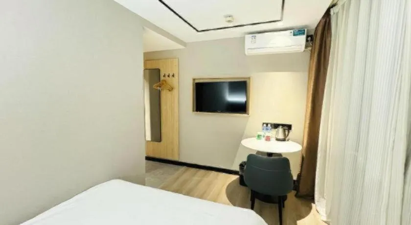 Bed in GreenTree Inn ShangHai KangQiao Industrial Zone JinXiu Road Business Hotel